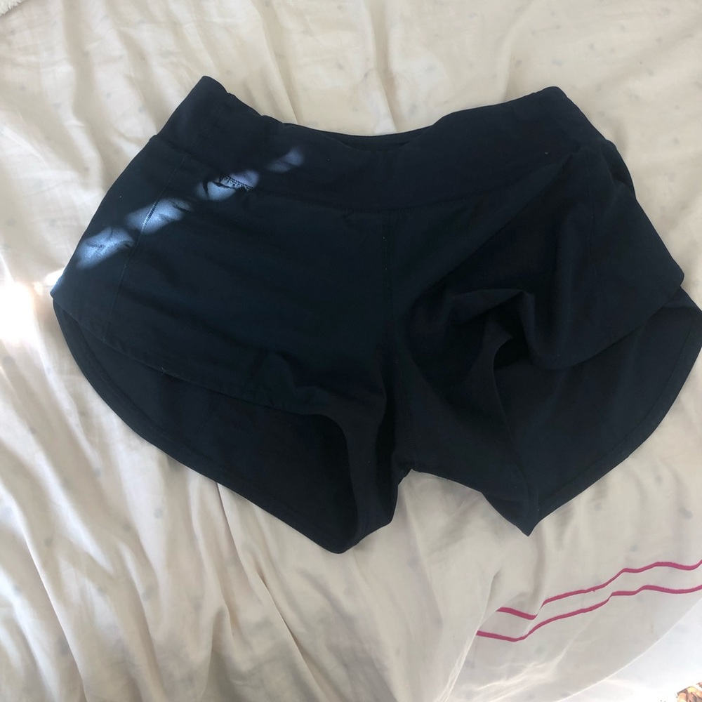 LULULEMON navy blue speed up short 4” size 8